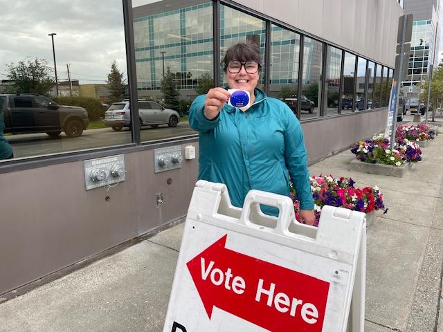 An Alaskan voter at a voting location